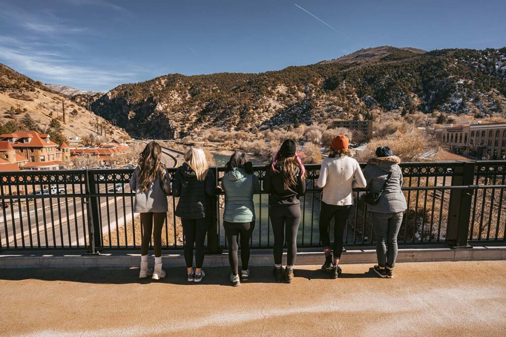 A group of women looking out at the mountains