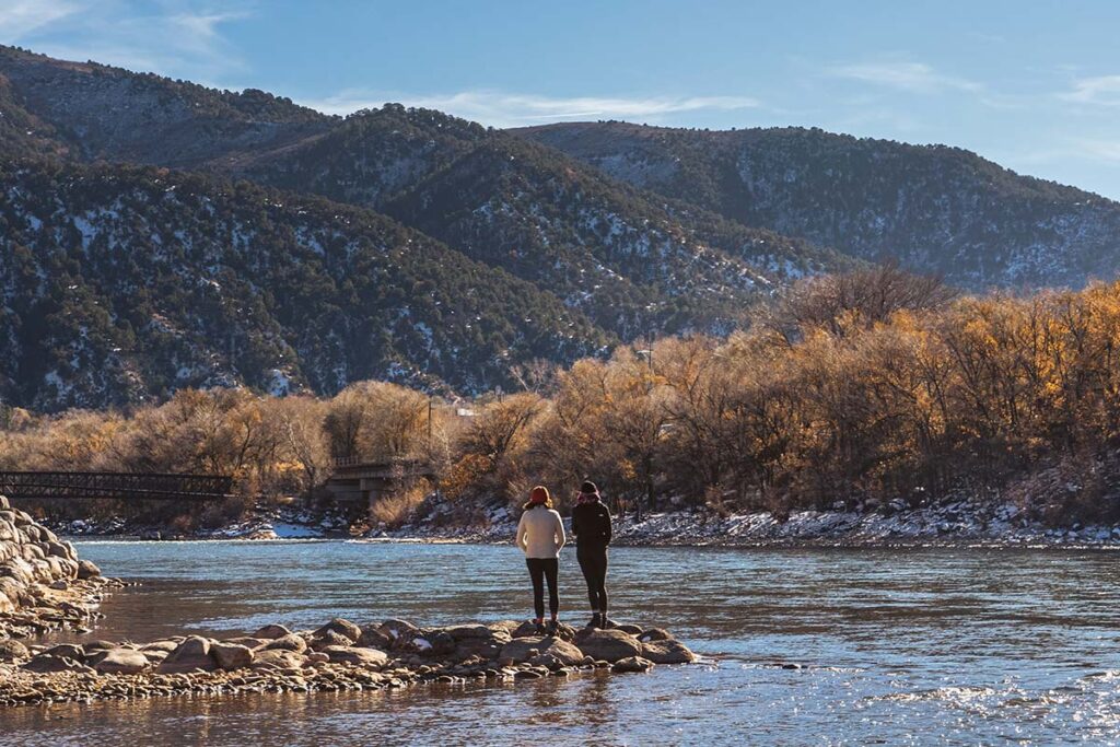 Two women looking at the mountains