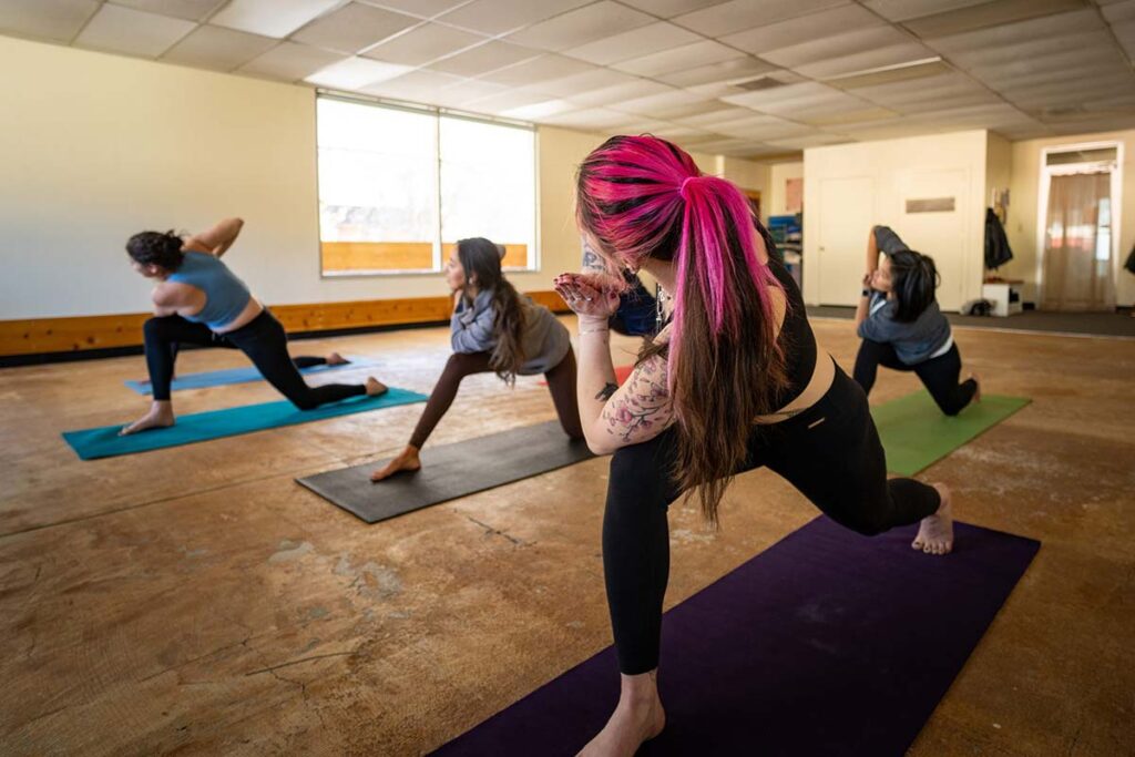 Women doing yoga at Momenta Recovery